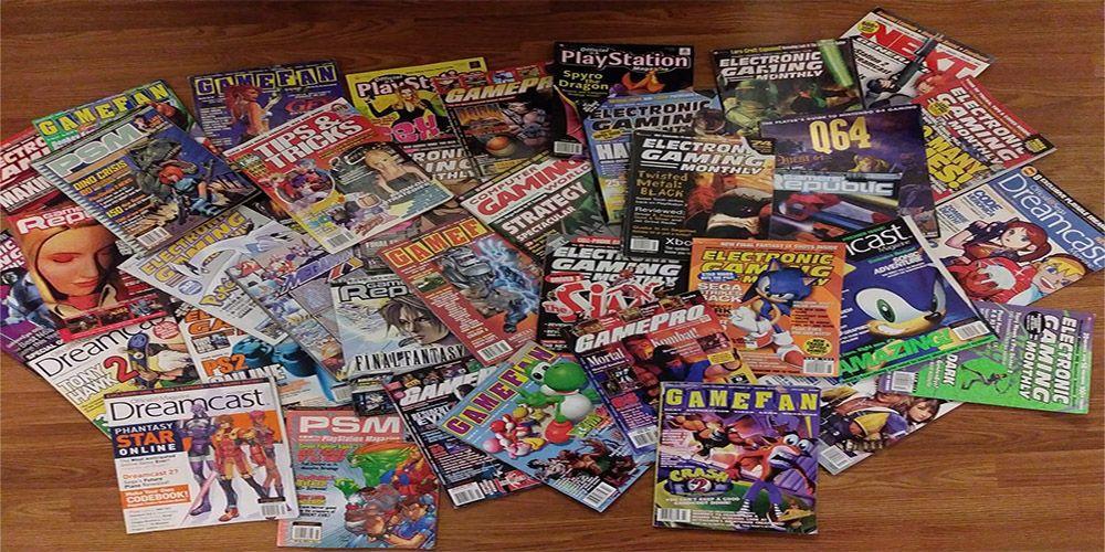 uma pilha de revistas de jogos no chão