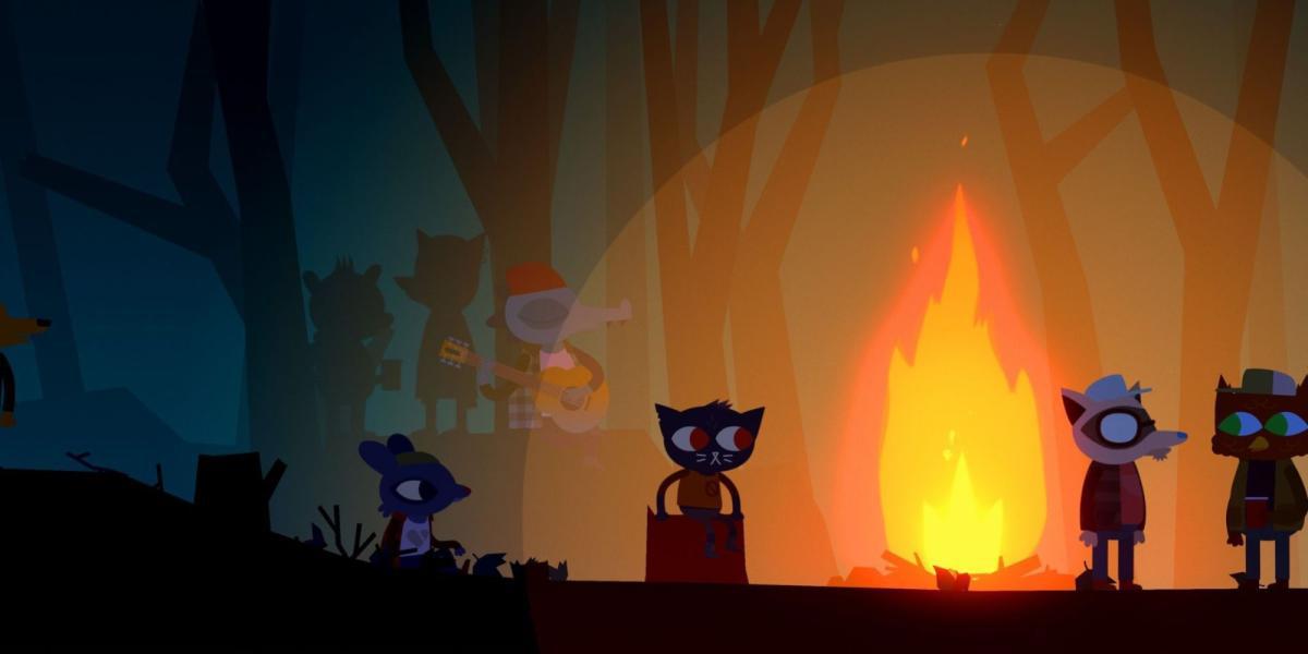 O jogador cercado por NPCs ao redor de uma fogueira em Night in the Woods