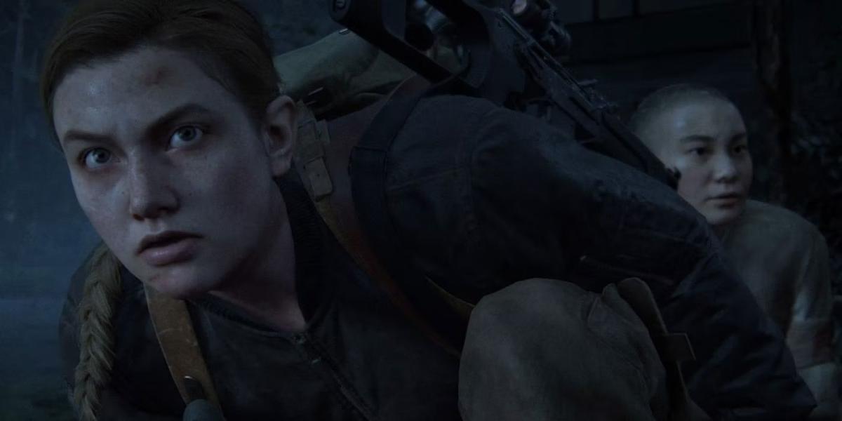 Abby protegendo Lev em The Last of Us Part II