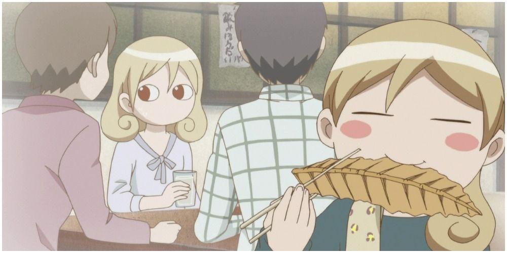 Uma linda garota desfrutando de comida em um restaurante japonês.