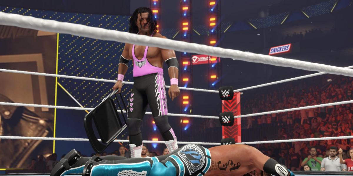 WWE 2K23 Bret Hart atacando AJ com uma cadeira