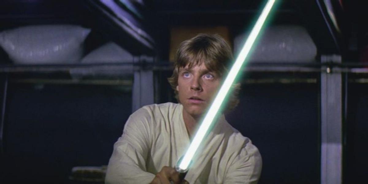 Luke Skywalker com sabre de luz