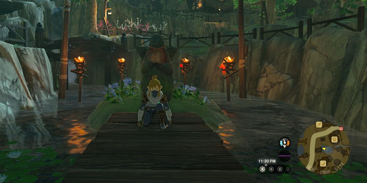 Legend of Zelda Tears of the Kngdom - Agachado em frente à estátua da deusa da vila de Kakariko