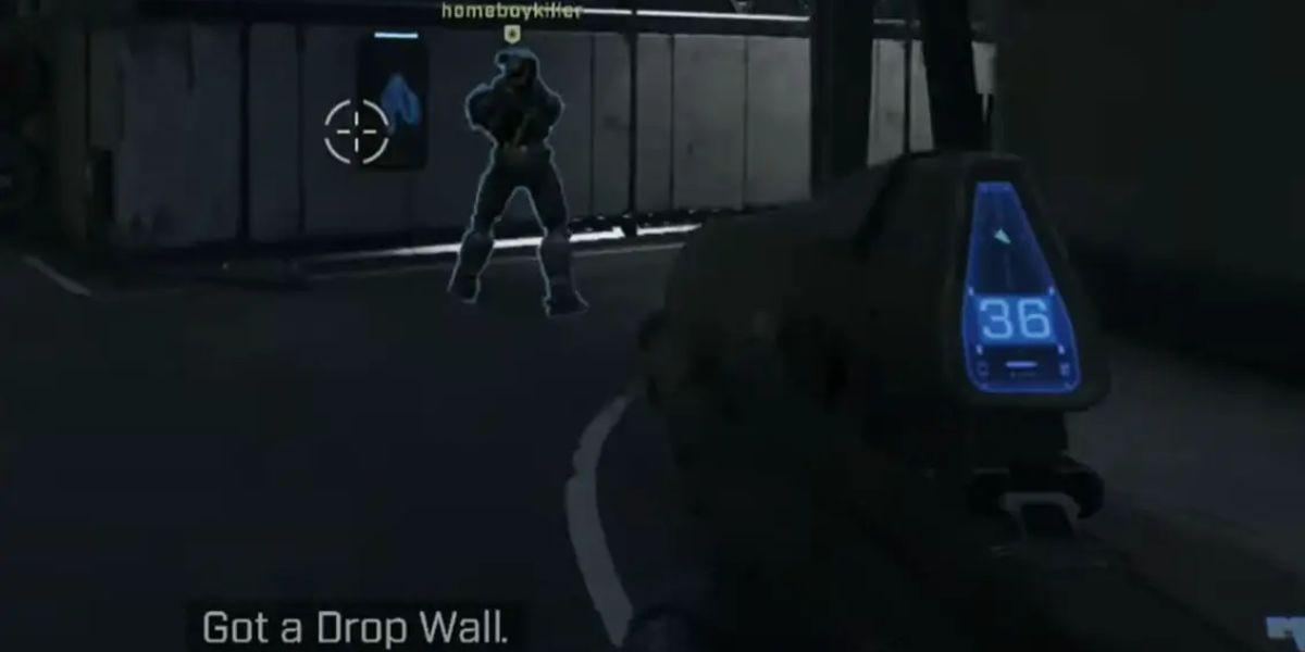 jogador usando uma parede suspensa para se proteger