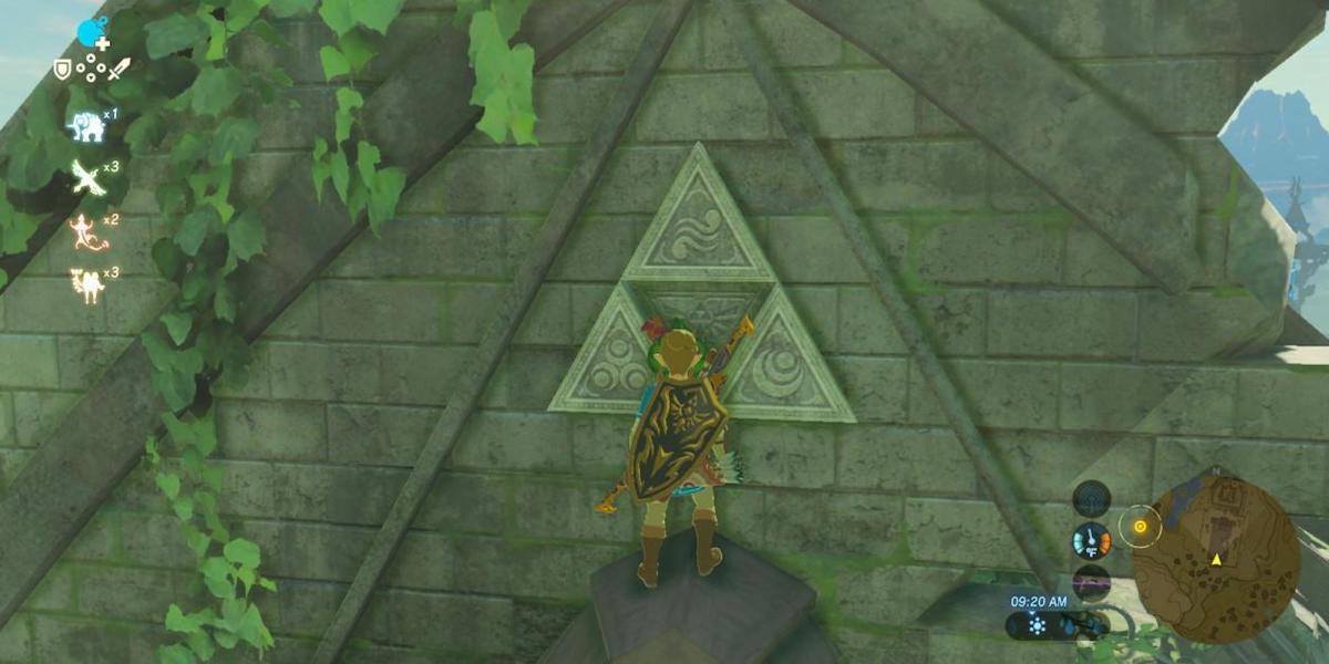 Link olhando para a Triforce
