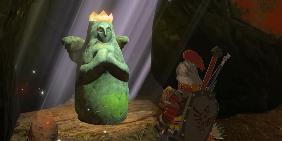 Link olhando para a estátua de Hylia