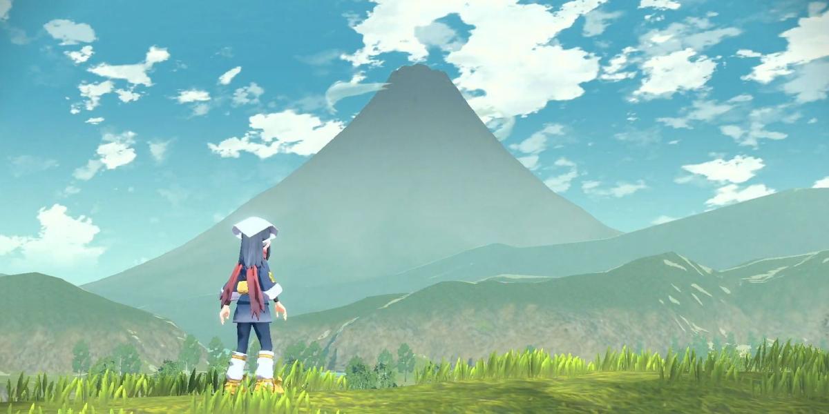 Um jogador olhando para o Monte Coronet como aparece em Pokemon Legends: Arceus
