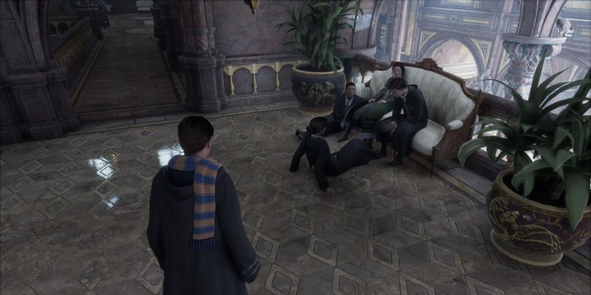 Alunos do legado de Hogwarts sentados casualmente