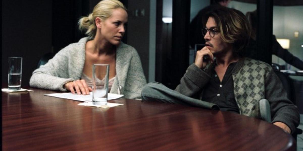 Amy e Mort conversando em uma mesa em Secret Window