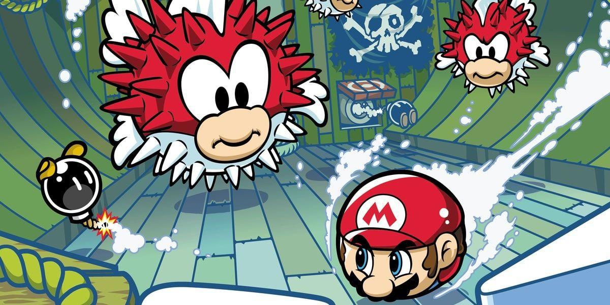 Mario lutando contra Pufferfish em arte para Mario Pinball Land