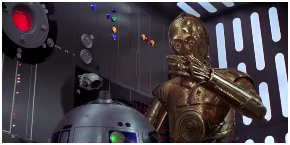 R2D2 e C-3PO em Star Wars: Uma Nova Esperança