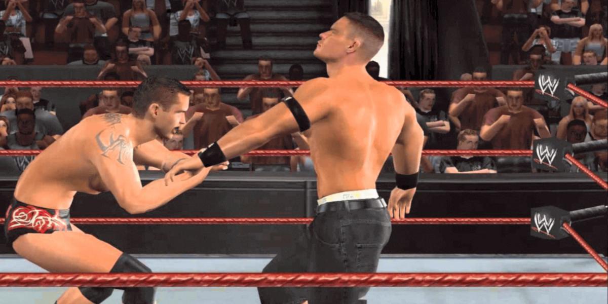 WWE Day of Reckoning Orton torcendo o braço de Cena