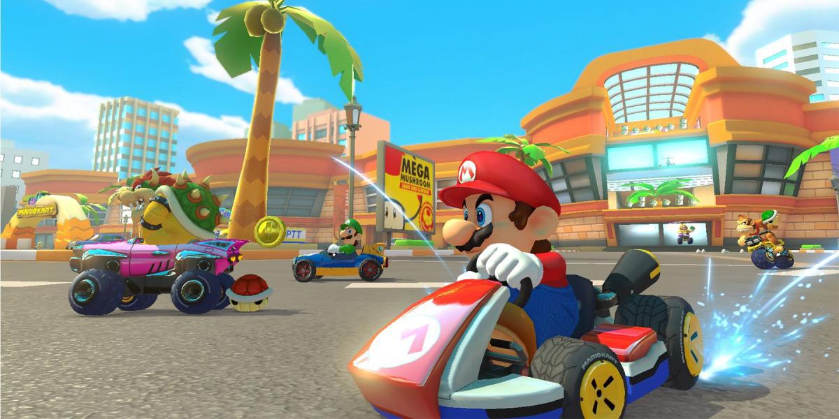 Mario em Kart à deriva ao lado de Bowser e Luigi no curso de Mario Kart