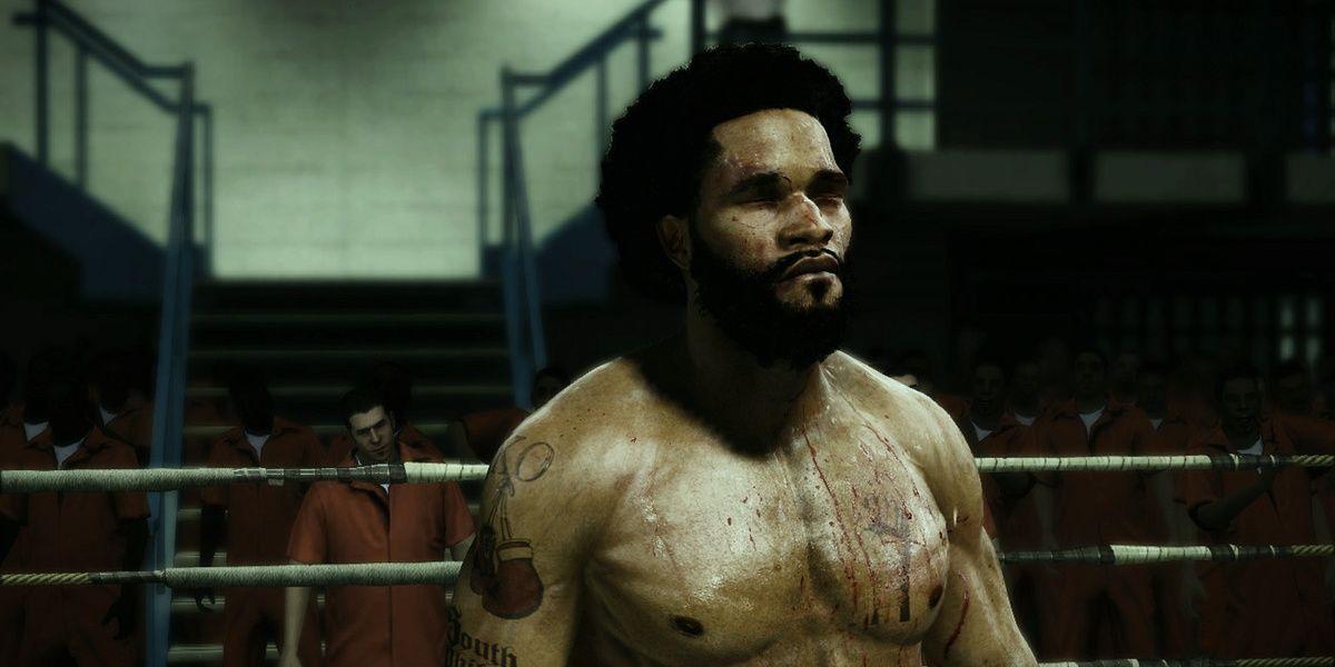 Um boxeador no ringue de uma prisão em Fight Night Champion
