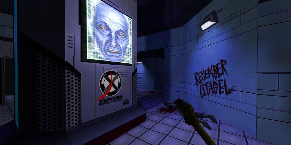 Uma captura de tela mostrando os corredores desolados do System Shock 2, uma tela mostrando um rosto de IA em uma parede, grafite na outra e um cadáver.