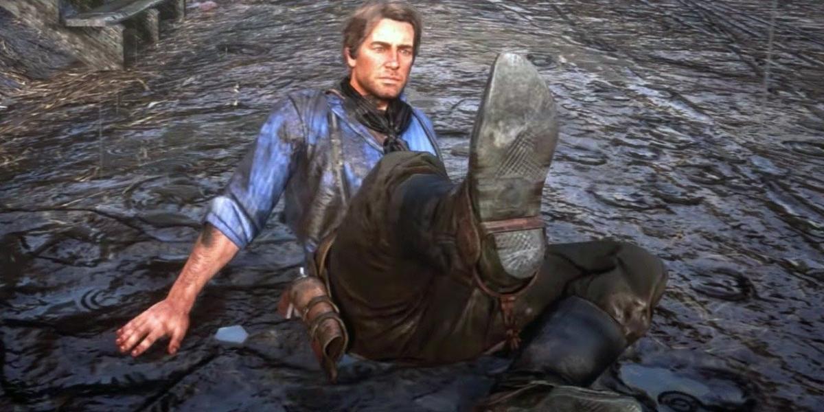 Red Dead Redemption 2 caindo na lama de Arthur