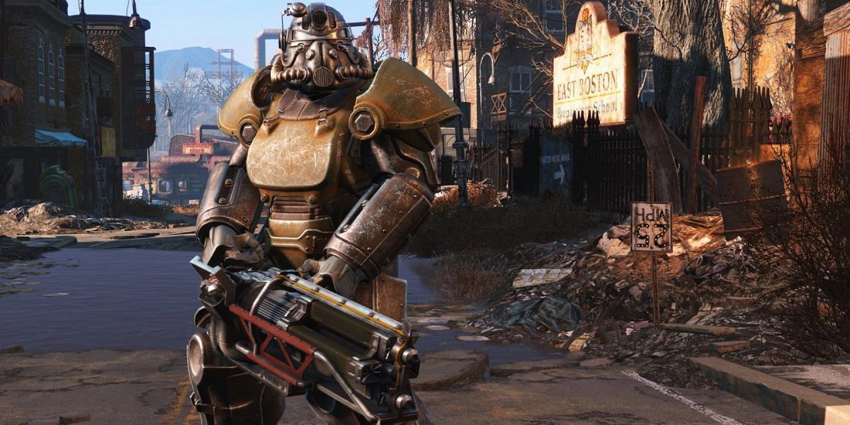 Imagem de Fallout 4 mostrando um membro da Brotherhood of Steel segurando um Gatling Laser.