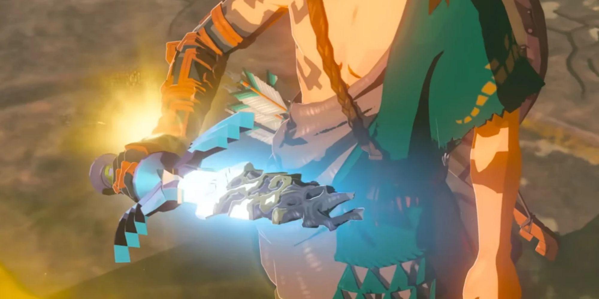Link segurando uma Master Sword quebrada