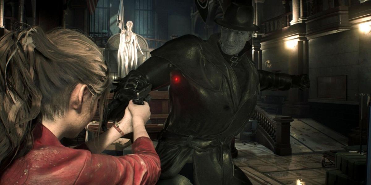 Resident Evil 2 Remake Mr. X prestes a dar um soco em Claire