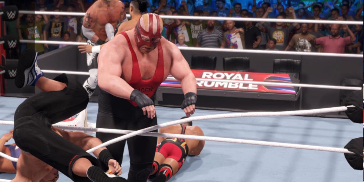 WWE2K23 Vader prendendo John Cena na corda superior