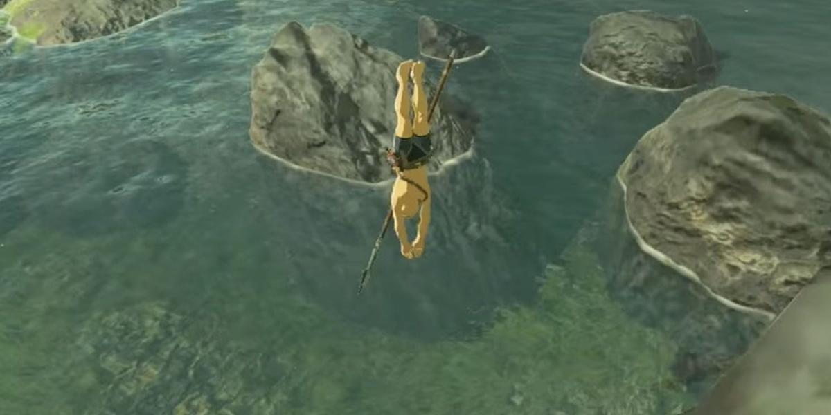 Uma captura de tela de Link pulando de um penhasco em The Legend of Zelda: Breath of the Wild.