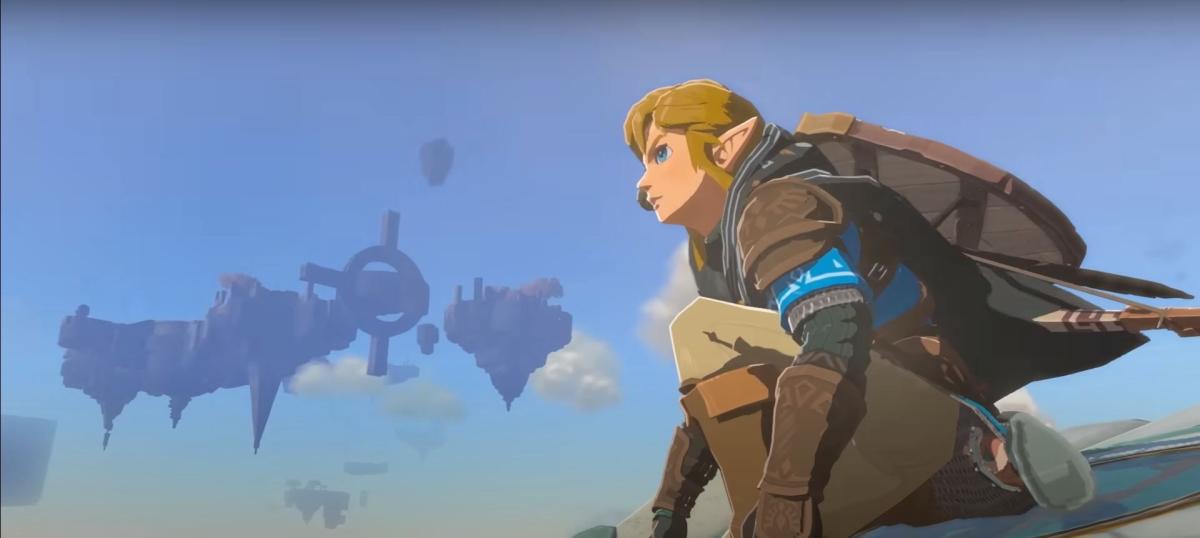 Link fica em um dispositivo e voa sobre Hyrule em The Legend of Zelda: Tears of the Kingdom.