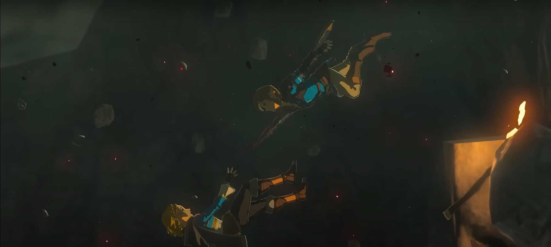 An image of Link trying to reach for Zelda's hand as she falls in The Legend Of Zelda: Tears of the Kingdom.