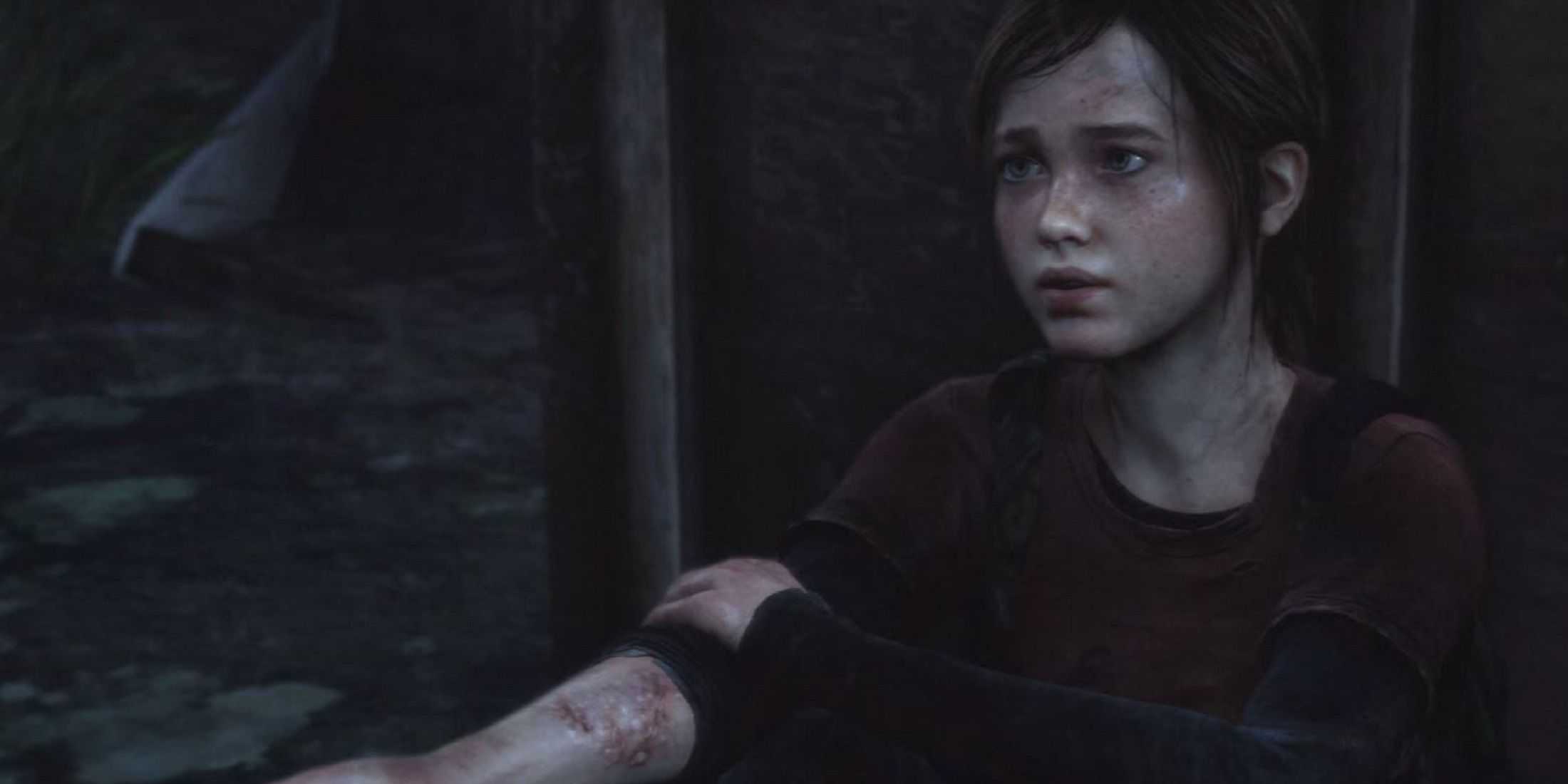 Ellie sits in a moment of quiet reflection, her infection injuries visible, from a poignant scene in The Last of Us