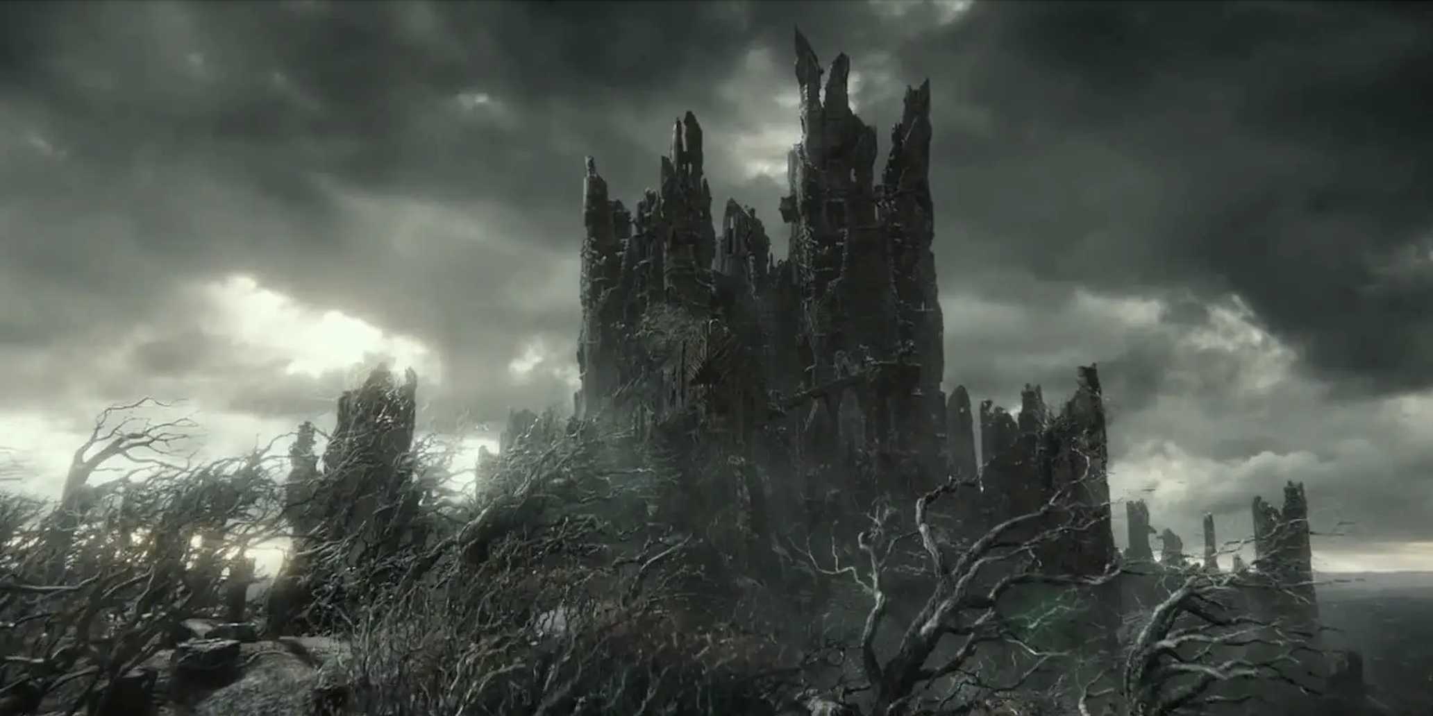 The tower of Dol Guldur amidst a desolate landscape from the Hobbit/LOTR