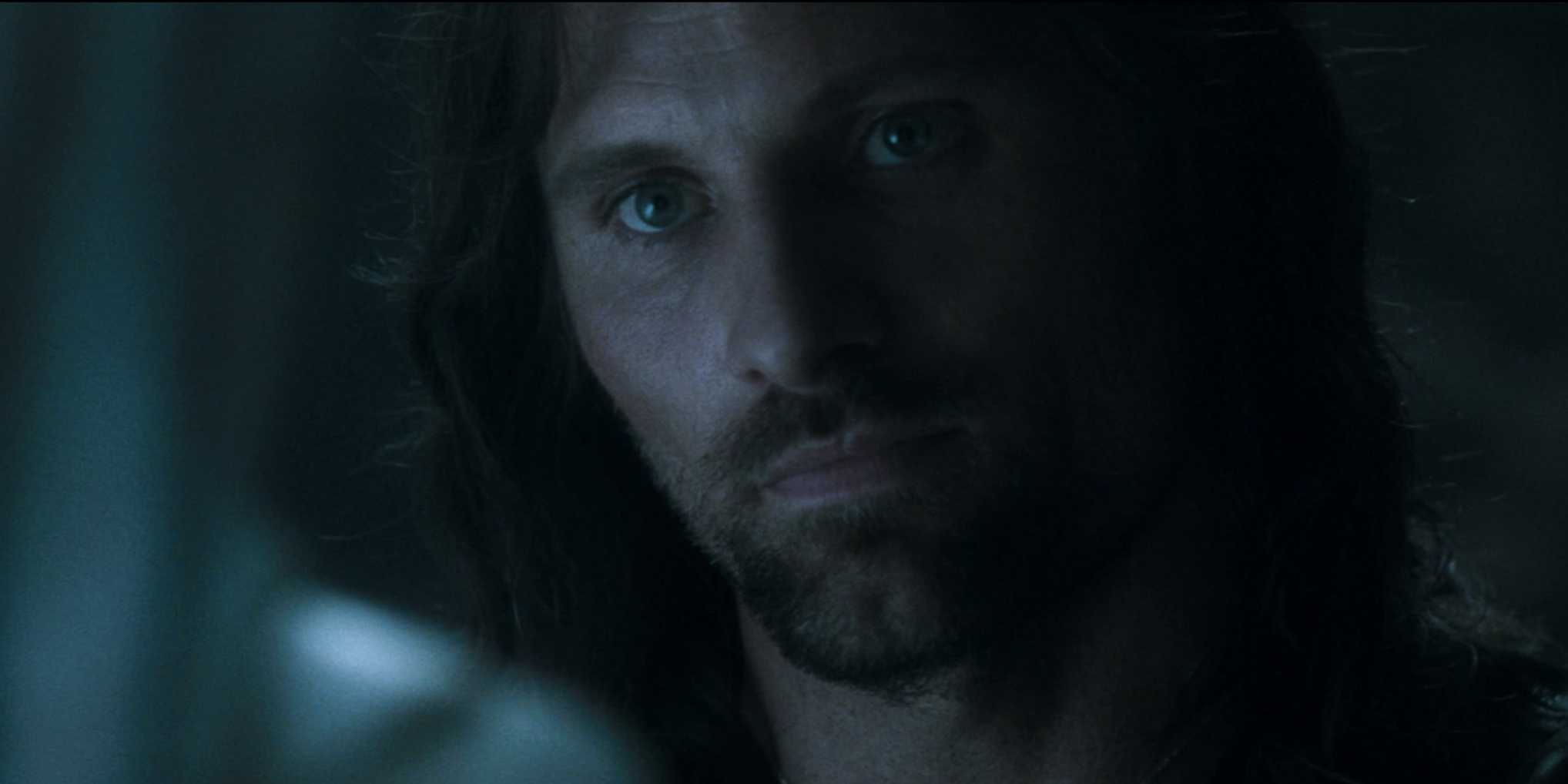 Um close de Aragorn na penumbra