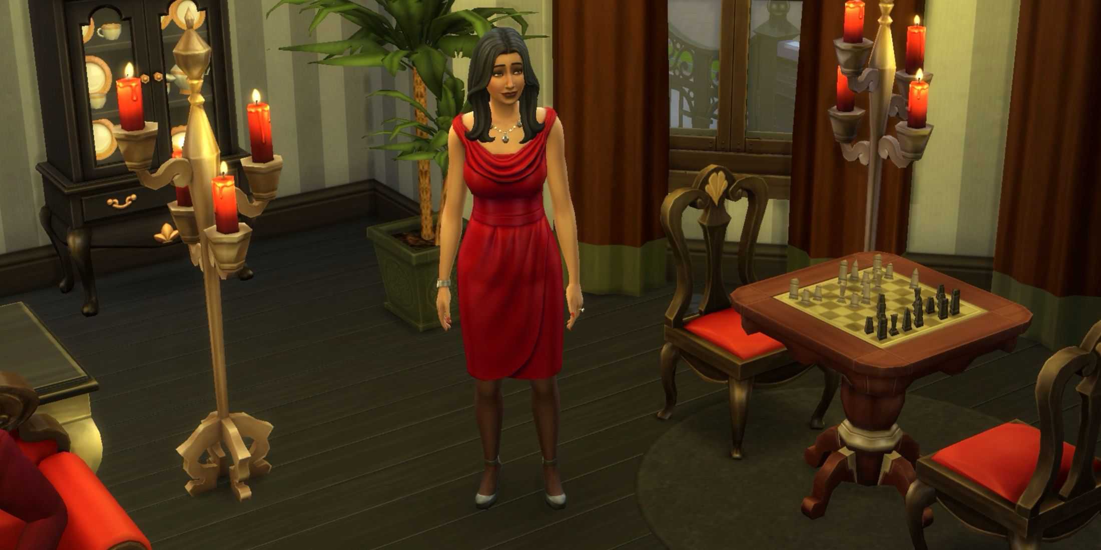 Bella Goth in a red dress