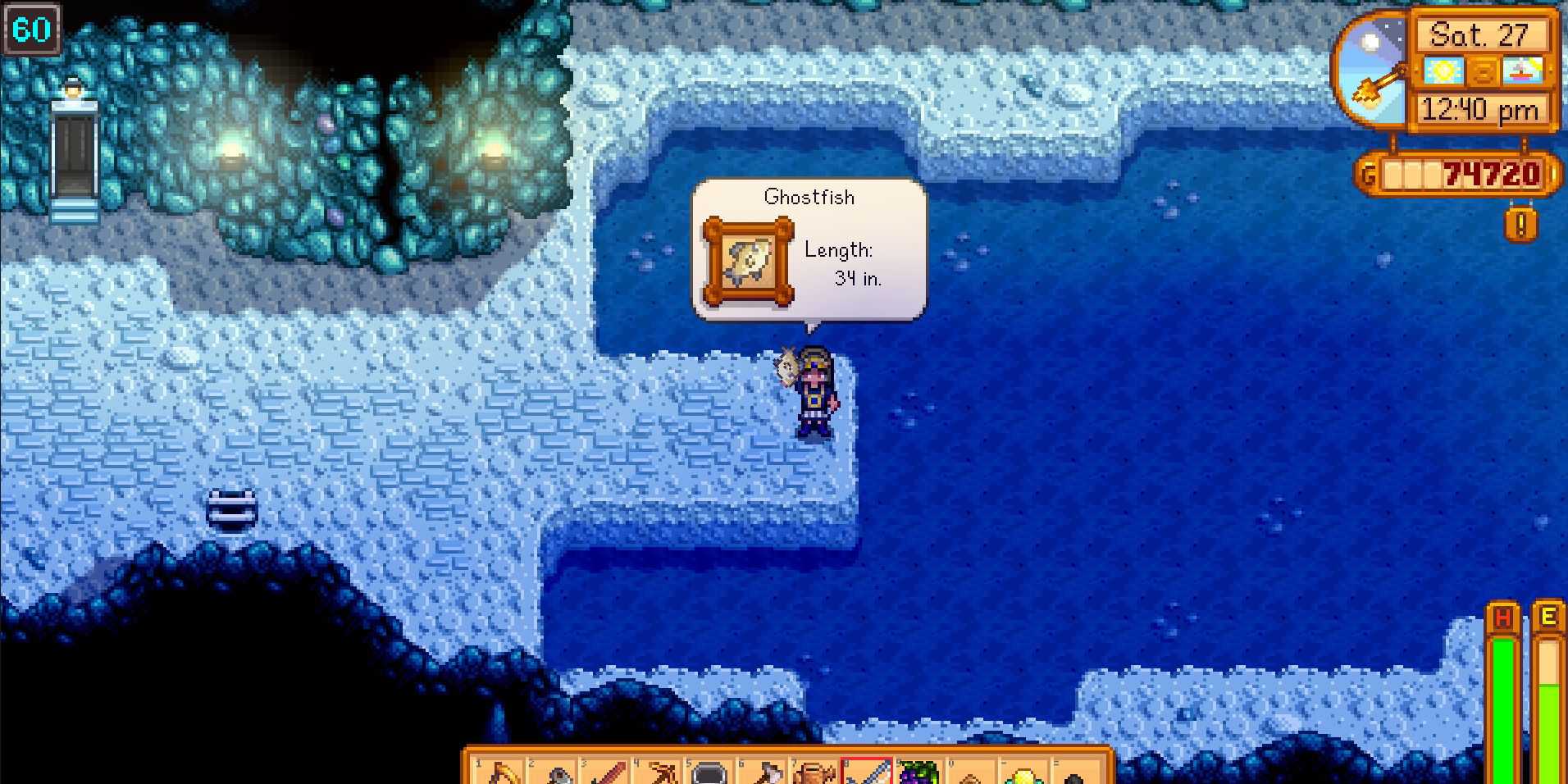 Imagem de um personagem pegando um Peixe Fantasma no Nível 60 das Minas em Stardew Valley