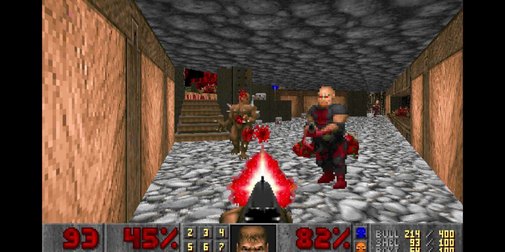 Um jogador atacando inimigos em Doom (1993)