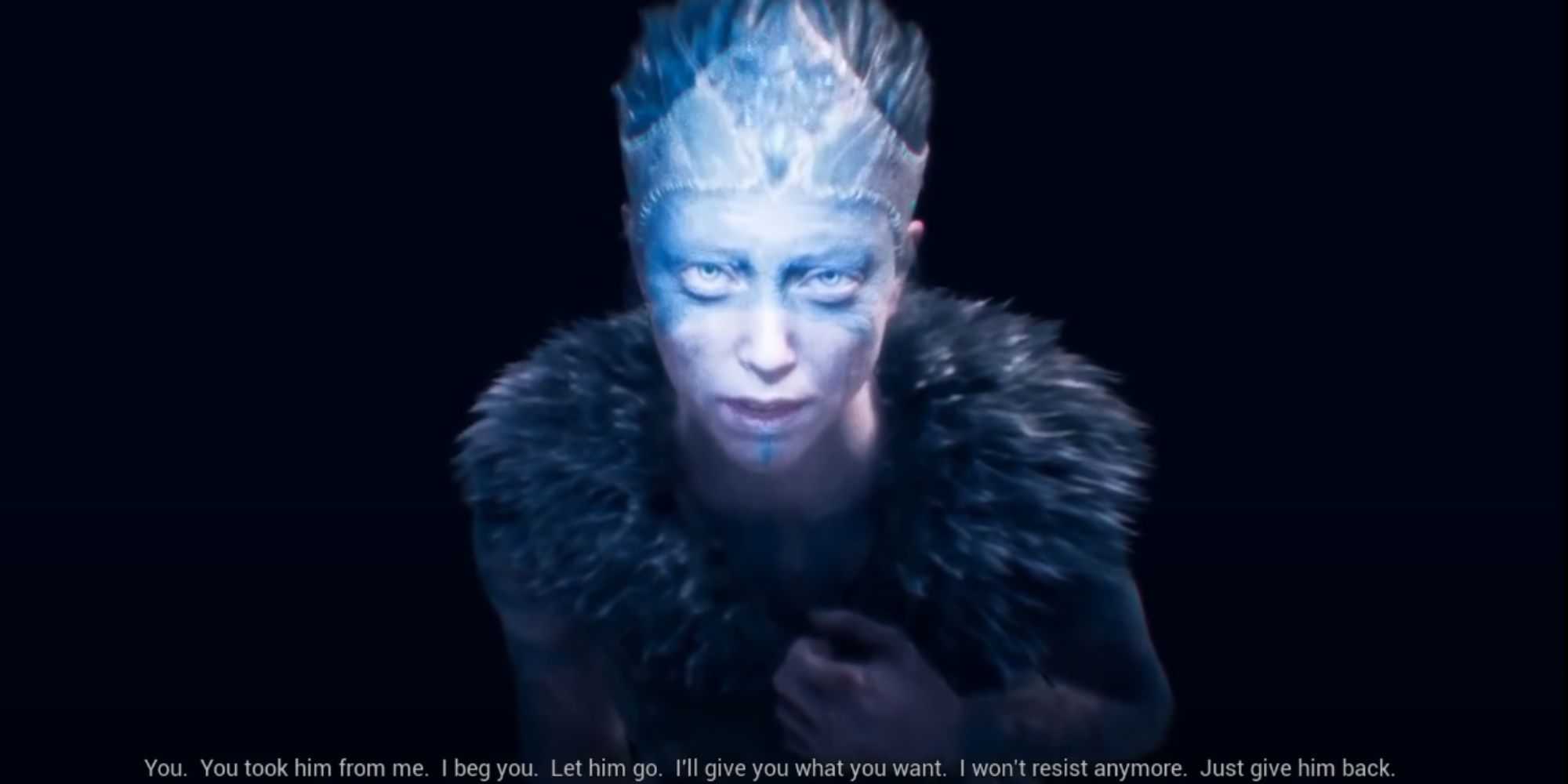 Senua from Hellblade looking into the camera