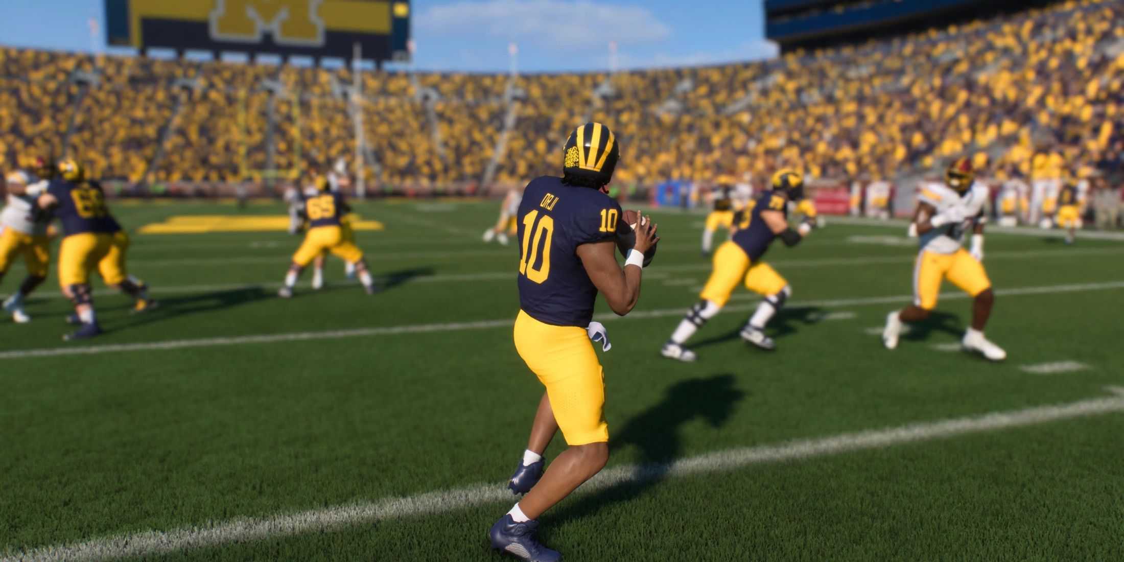 Michigan Wolverines QB Alex Orji with the ball in College Football 25