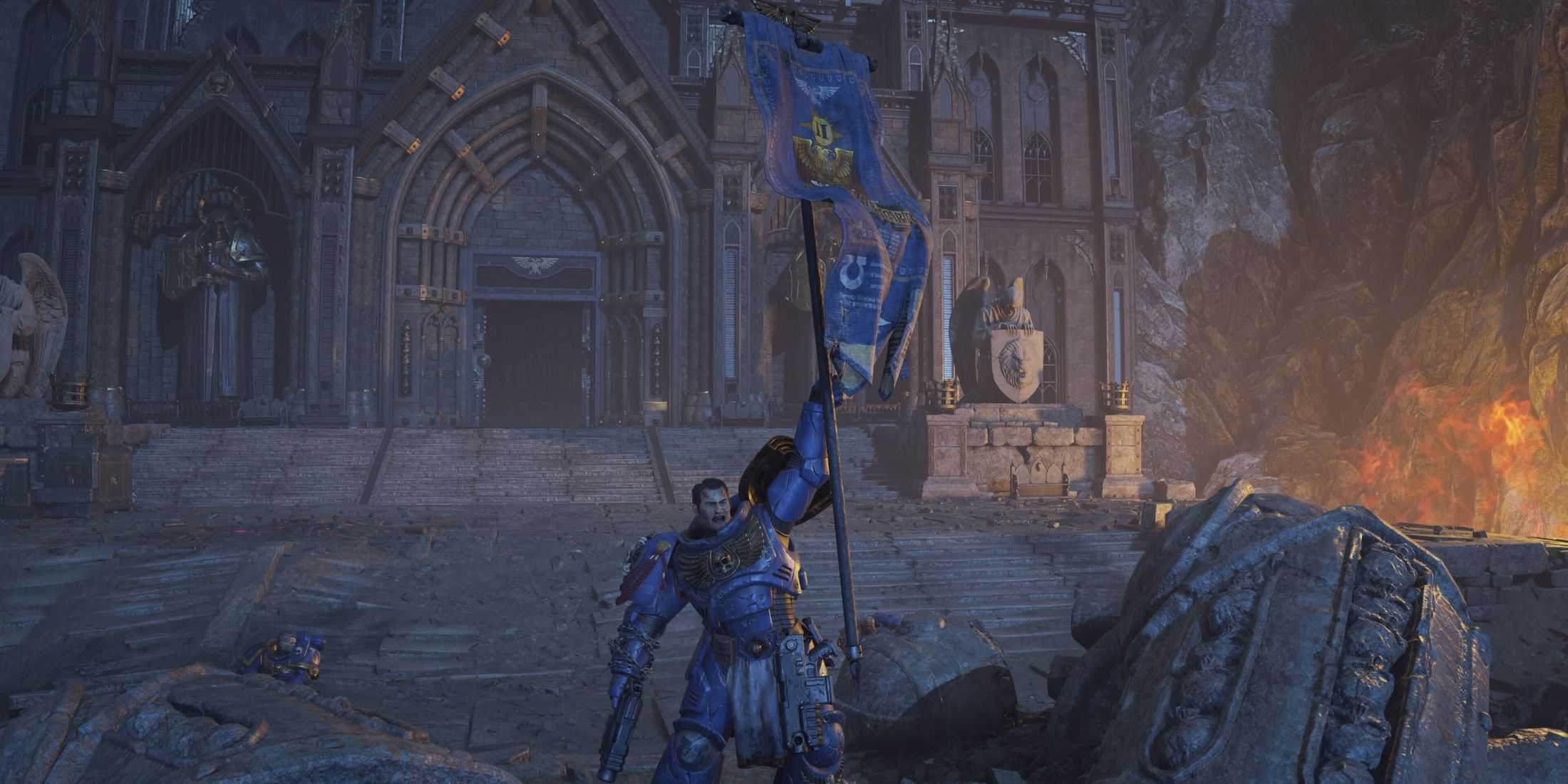 Titus holding the Ultramarines banner in Space Marine 2