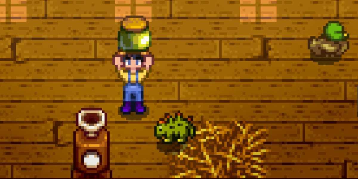 Um fazendeiro segurando um pote de maionese de dinossauro ao lado de um dinossauro em Stardew Valley