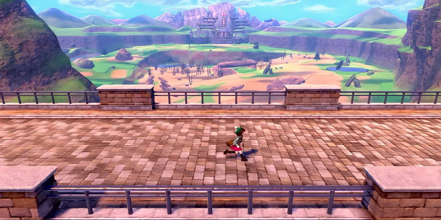 the main character of pokemon sword and shield running down a bridge