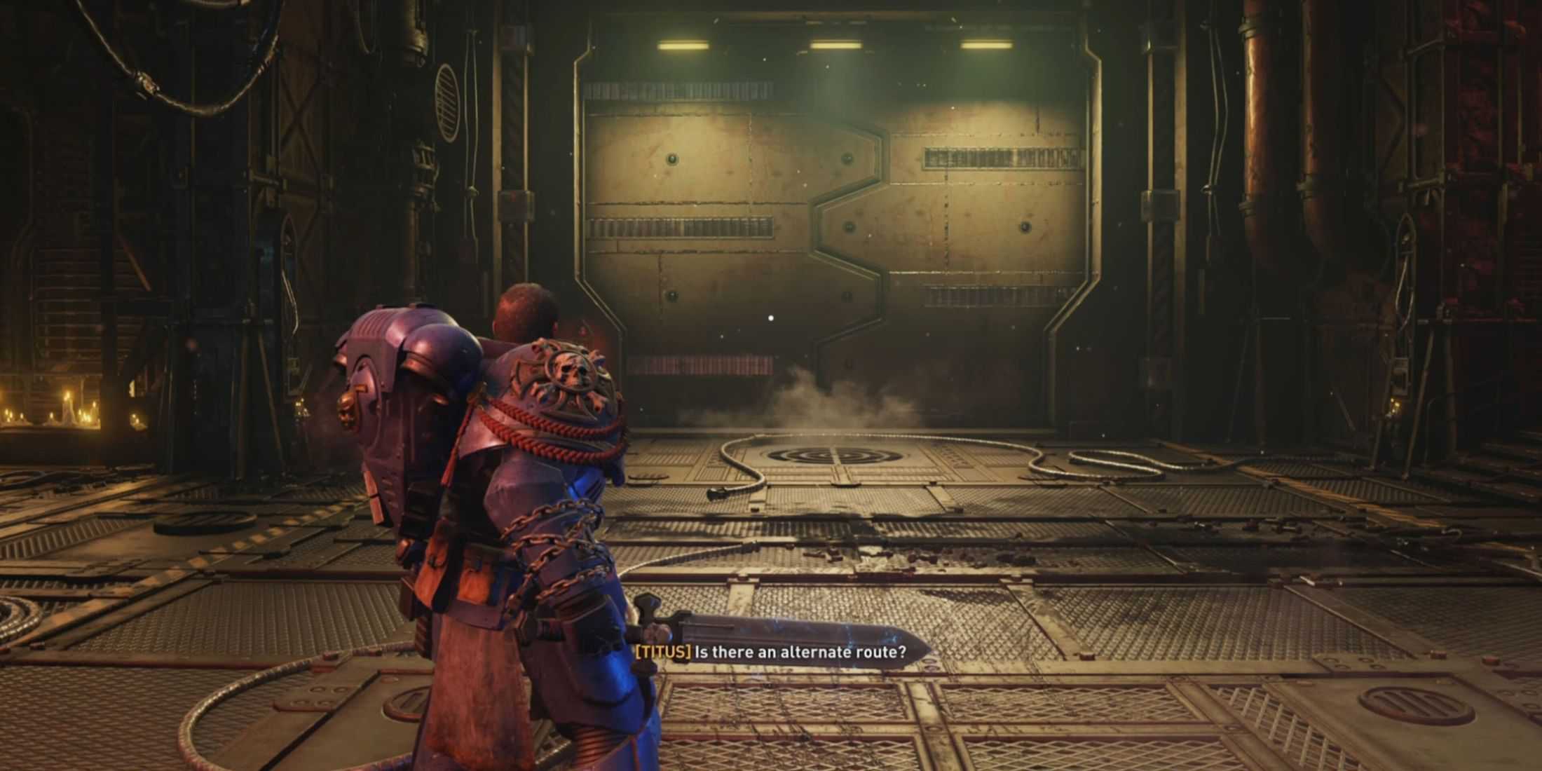 Titus standing in front of a heavy door in Space Marine 2