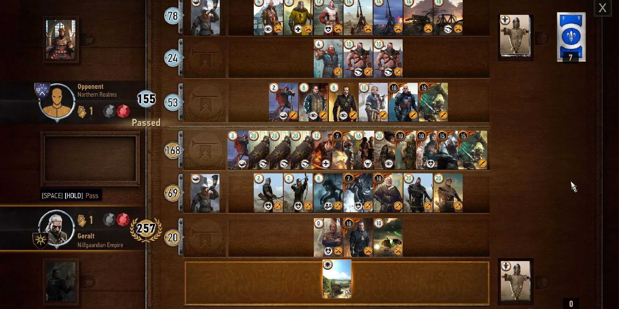 An on-hoinh game of gwent in the Witcher, the board almost full of cards. 