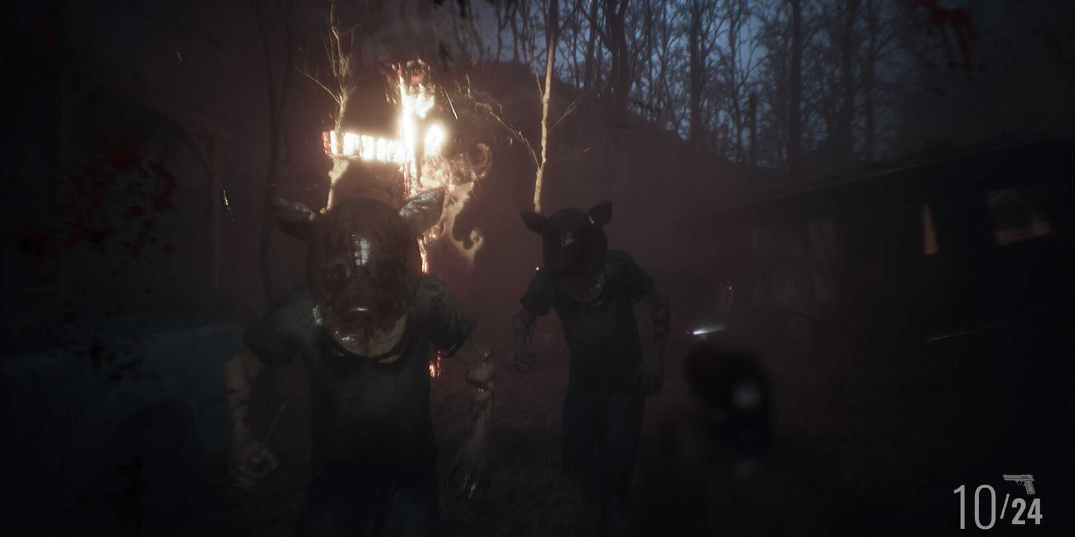 fire burning in the background behind people wearing pig masks