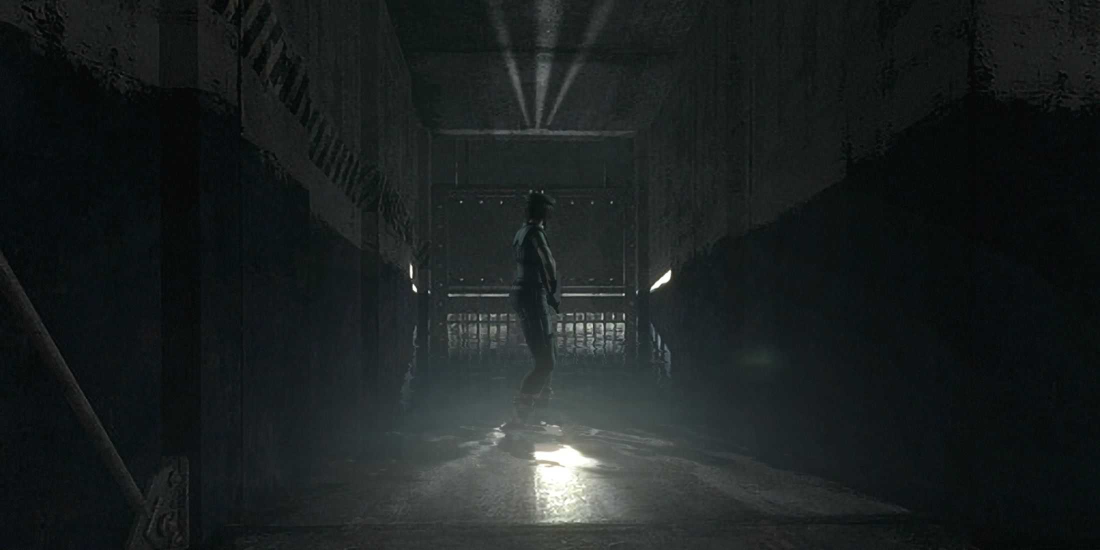 Jill Valentine standing in a dimly lit tunnel