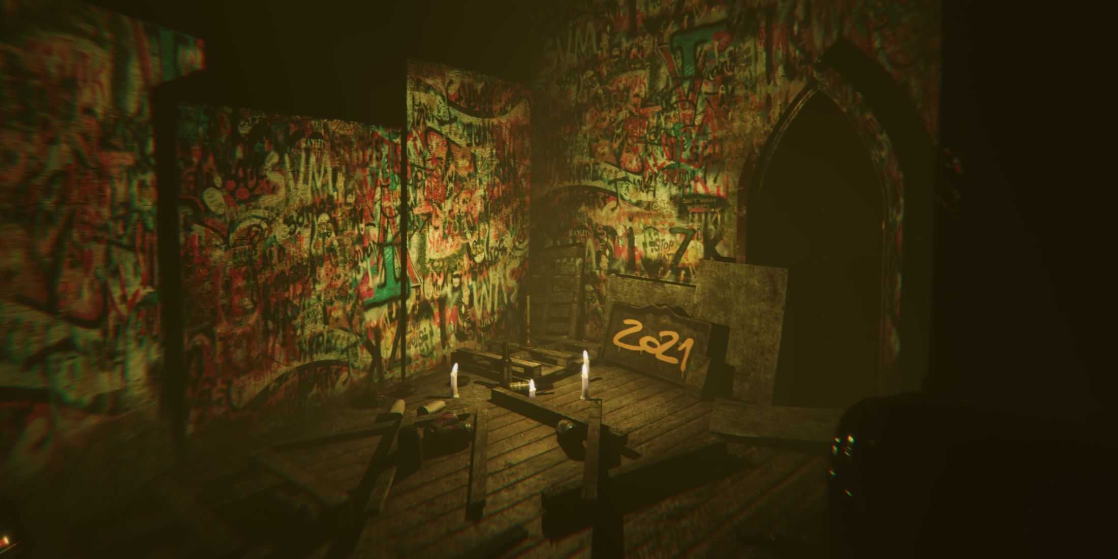 A room covered in graffiti with '2021' written on a slab