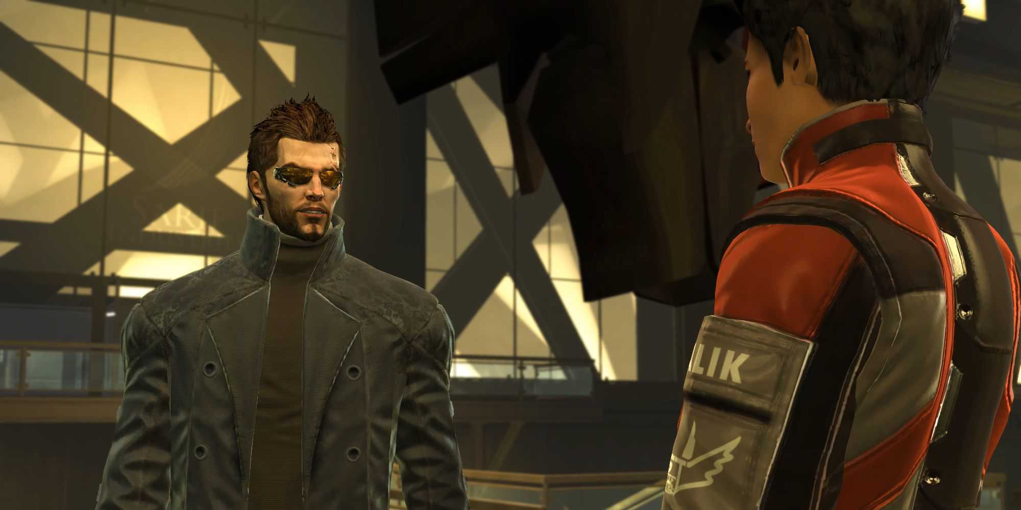 Adam Jensen speaking with Malik in Deus Ex: Human Revolution