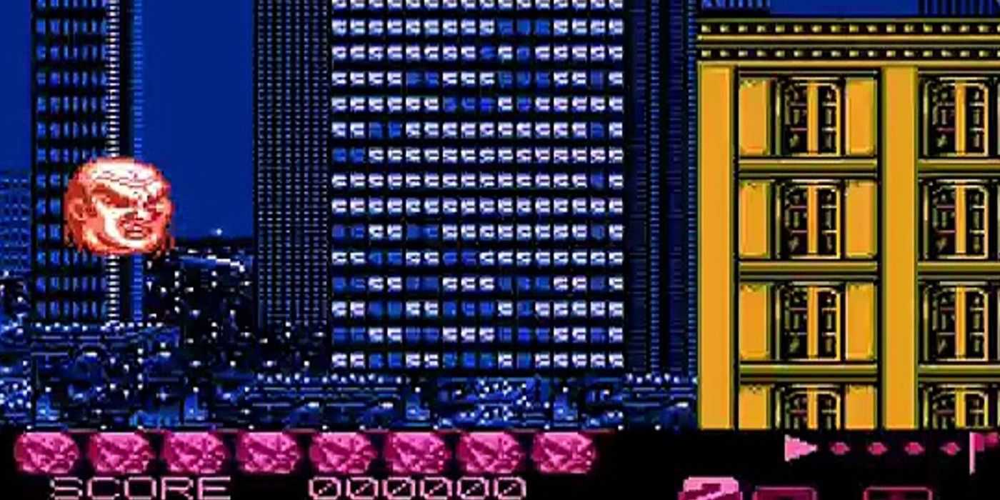 Zombie Nation NES crimson floating head in dark city platforming stage