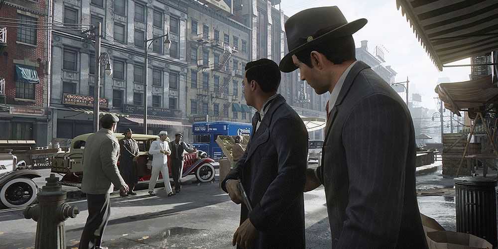 Uma rua movimentada em Mafia: Definitive Edition