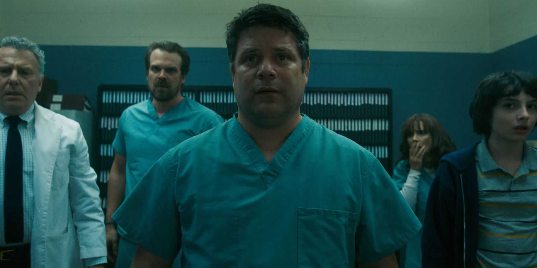 Bob standing in Hawkins Lab in Stranger Things