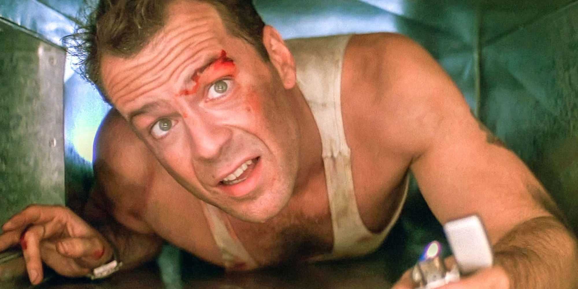 Uma imagem de John McClane rastejando pela passagem de ventilação