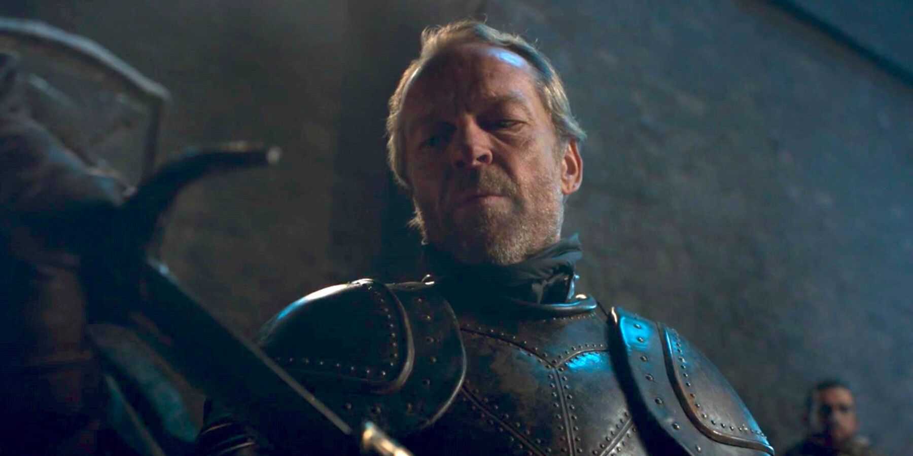 Jorah Mormont looks down at his sword