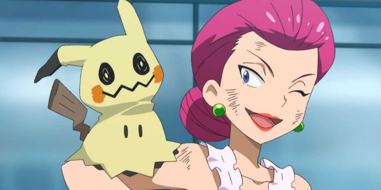 Jessie with Mimikyu perched on her arm